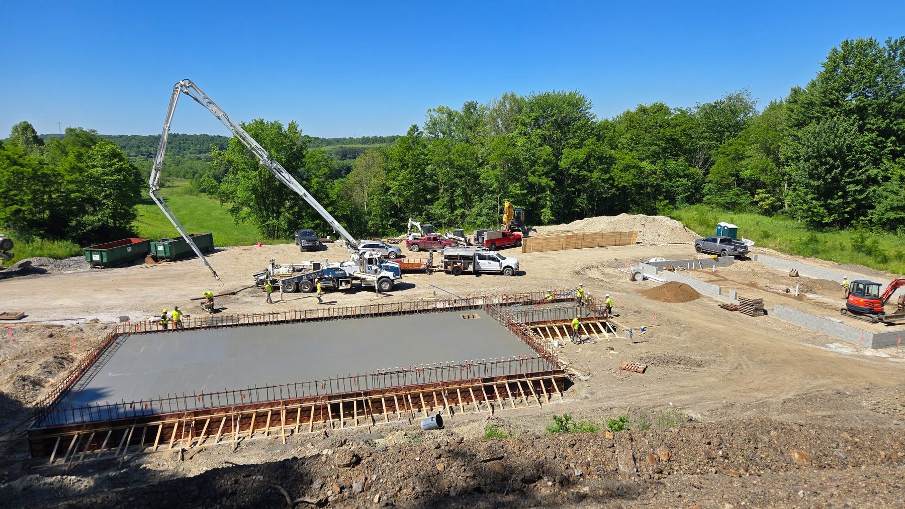Concrete foundation placement with field crew